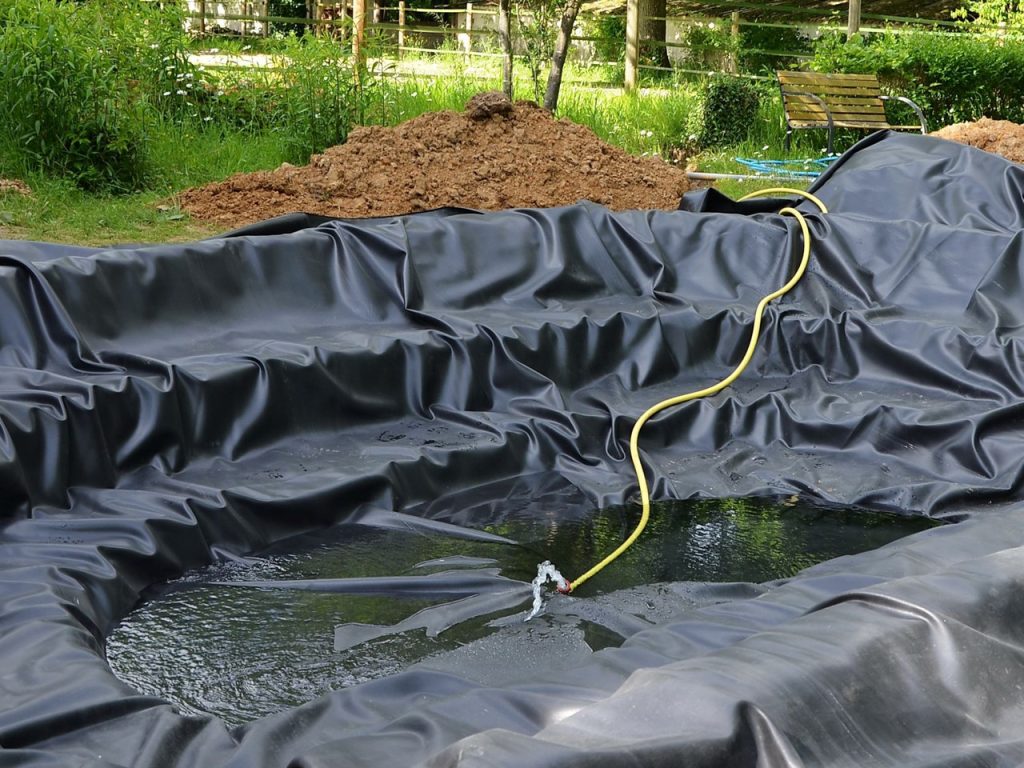 Cutting Hole In Preformed Pond Liner For Plumbing