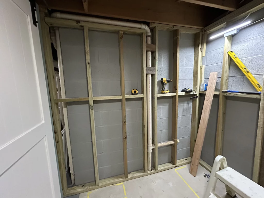 How To Frame Around Plumbing Pipes In Basement