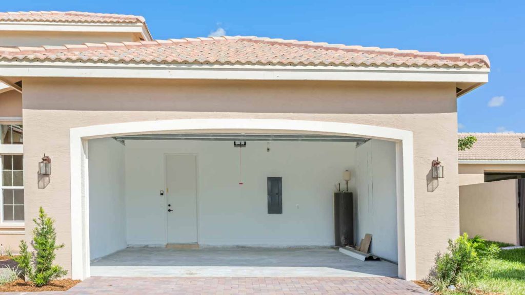 Call Plumber Or Roofer For Water Leak In Garage Wall