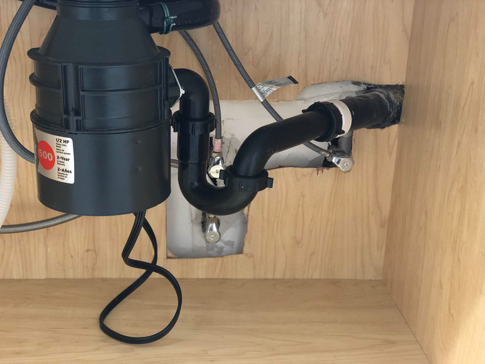 How to Cut Back a Sink Cabinet for Plumbing Lines