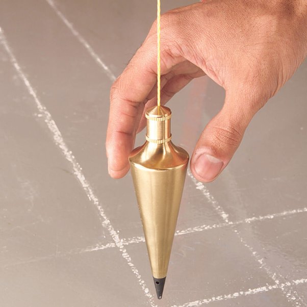 How Do Plumb Bobs Work If the Earth Is Spinning?