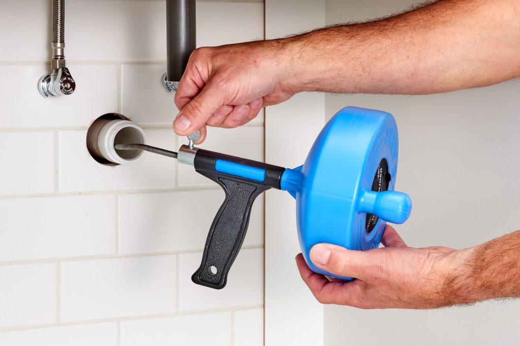 How To Curve The Plumbing Snakes Head Into A Pipe