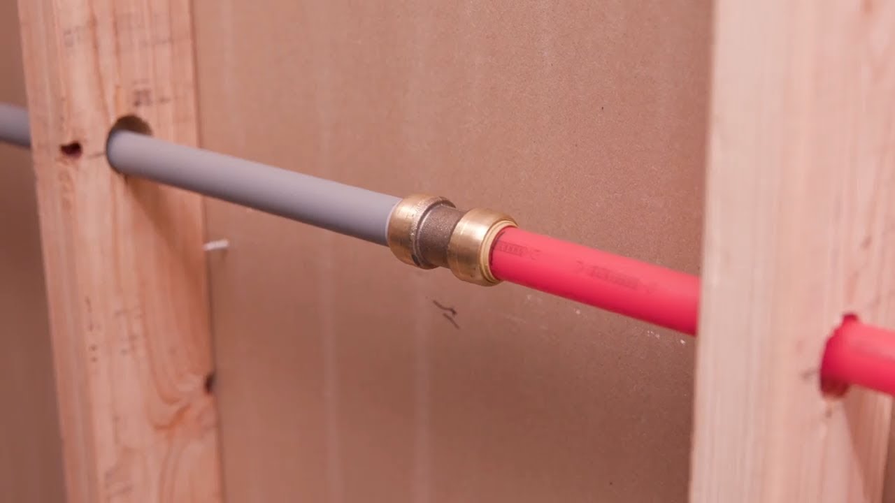How to Insert a Copper Plumbing Tee Into Polybutylene Pipe
