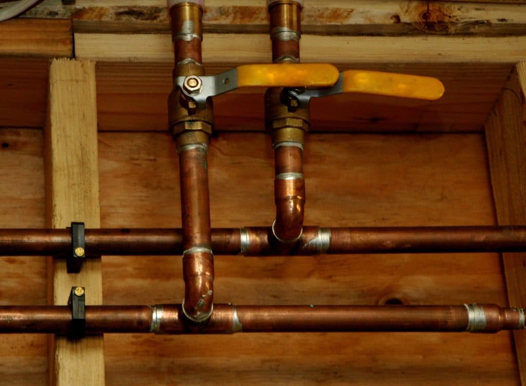 Should Copper Plumbing Touch Wood? Here’s What You Need to Know