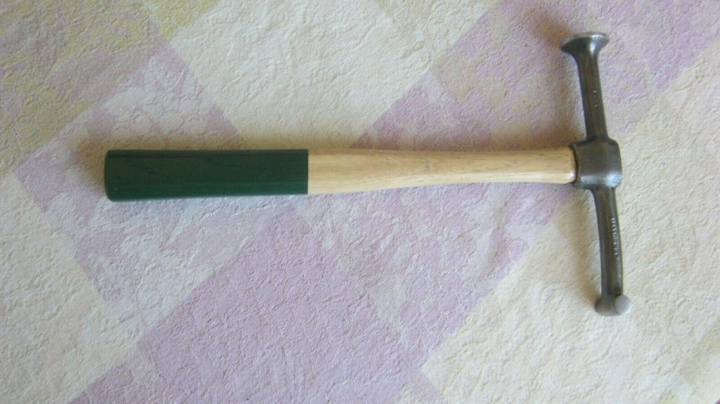 Old Plumb Hammer With The Number 1426 Stamped On It