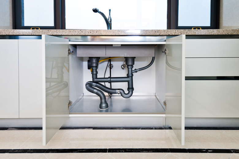 Sealing Up Under Kitchen Sink: Stop Leaks Where Plumbing Enters Your Home
