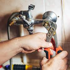 The Plumber Clamped the Leaky Pipe With His Tools