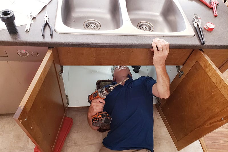 Plumber Cost: Disposal Repair vs. Replacement