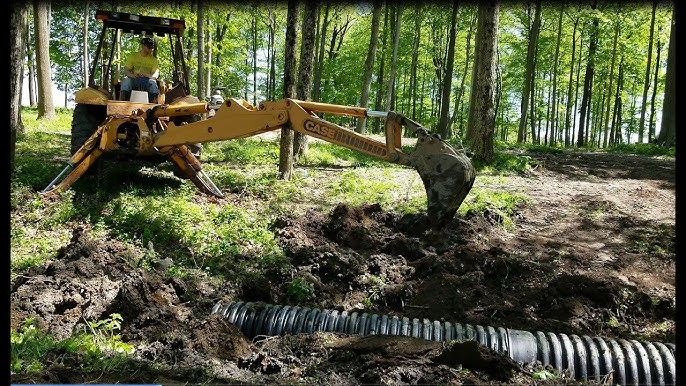Digging Plumbing Holes with a Woods Backhoe