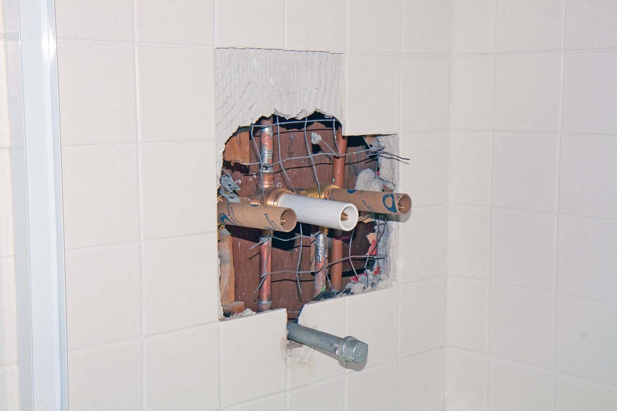 Do I Need a Plumber for Shower Tile Replacement?