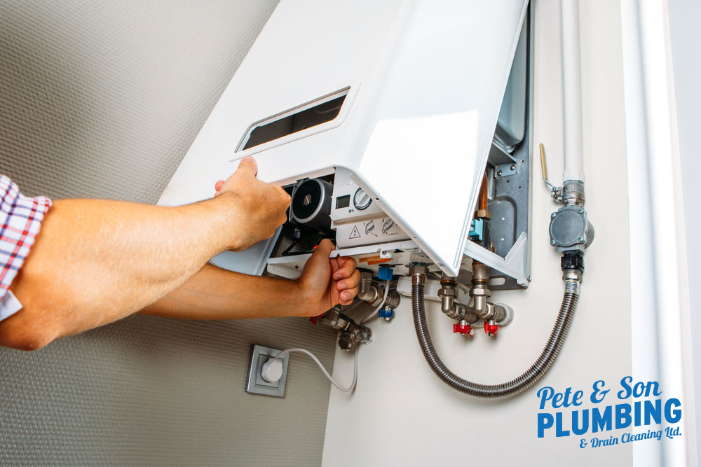 Electrician or Plumber for Tankless Heater?