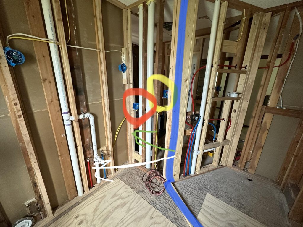 Electrical Outlet In Same Bay As Plumbing Behind Shower