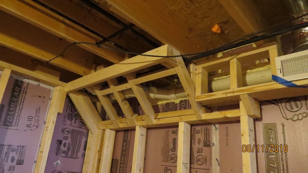 Frame A Wall Around Plumbing On Ceiling Floor Joists