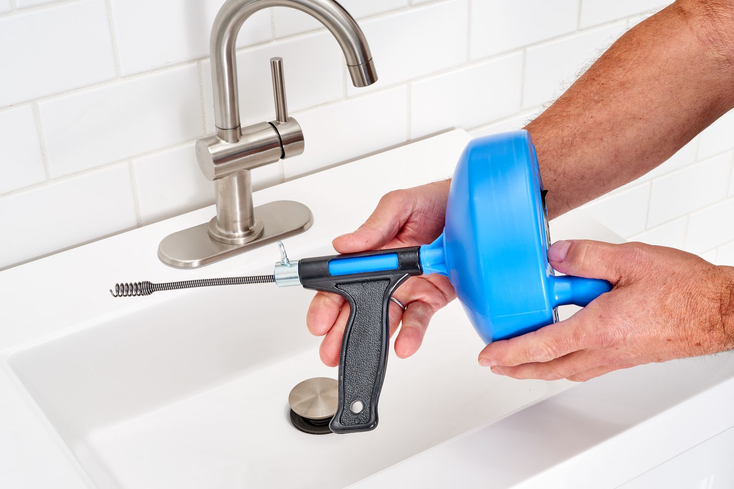 How to Get a Plumbing Snake to Turn Corner in Floor Drain