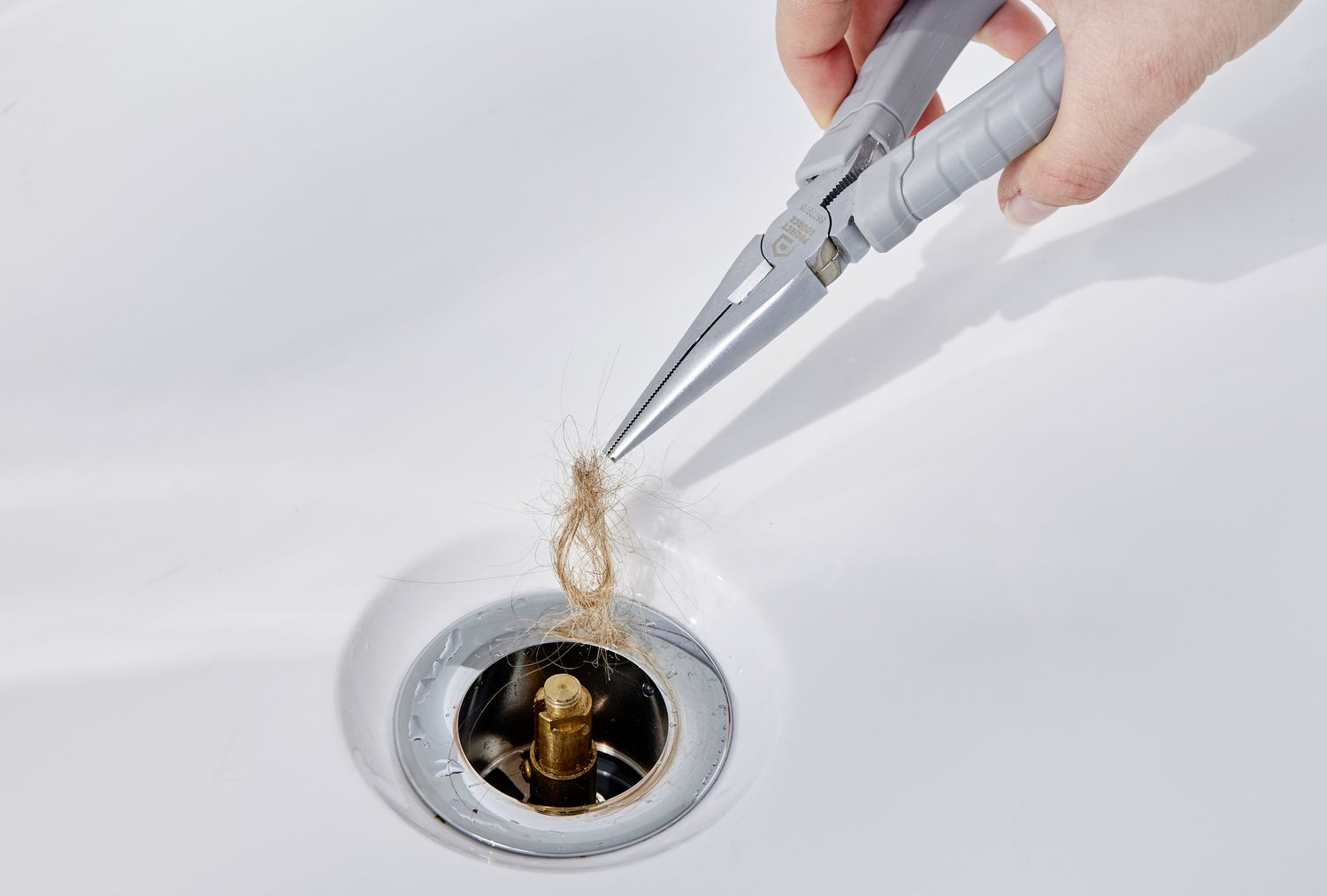Fix Slow Draining Tub: Fischer Plumbing Home Remedies