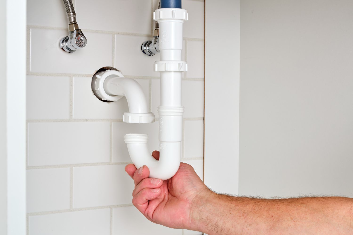 How To Convert Sink Plumbing From Floor To Wall