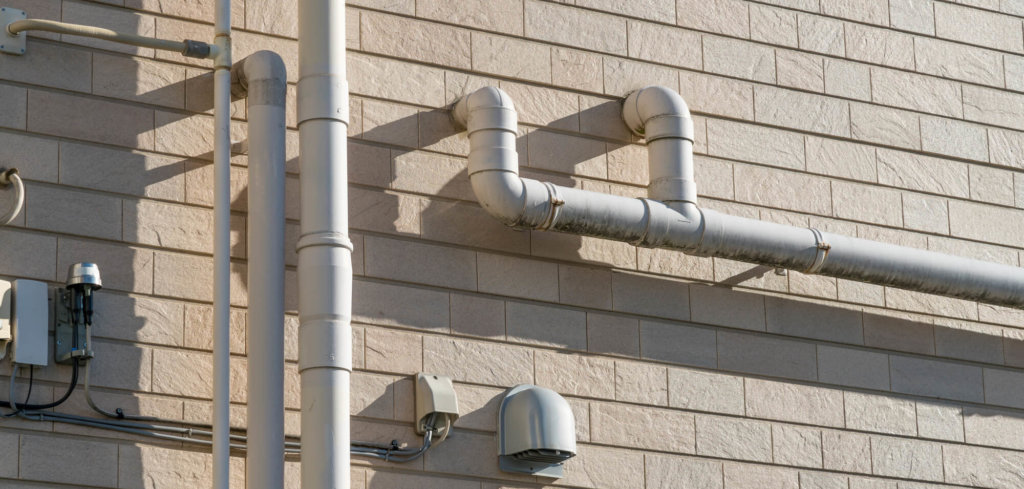 Hide Odd Basement Pipes: 7 Clever DIY Fixes