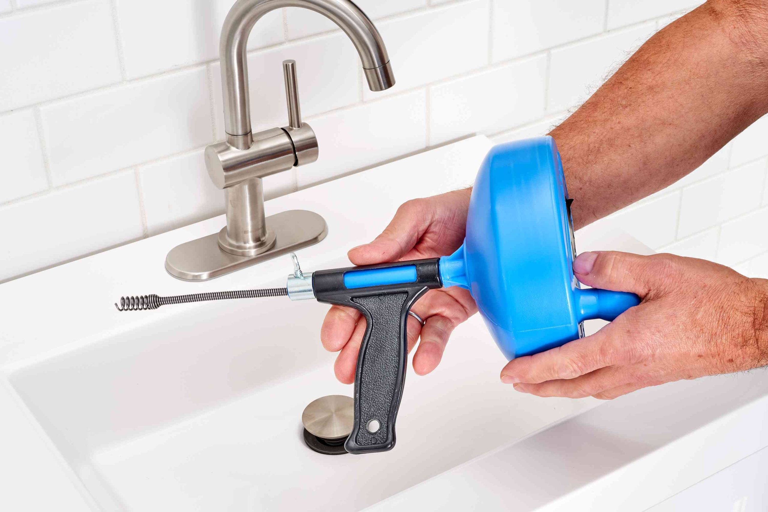 How to Make a Plumbing Snake Turn Pipe Corners