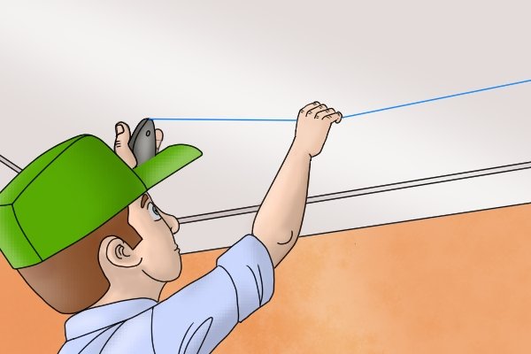 Master the Chalk Plumb Line for Perfect Wallpapering