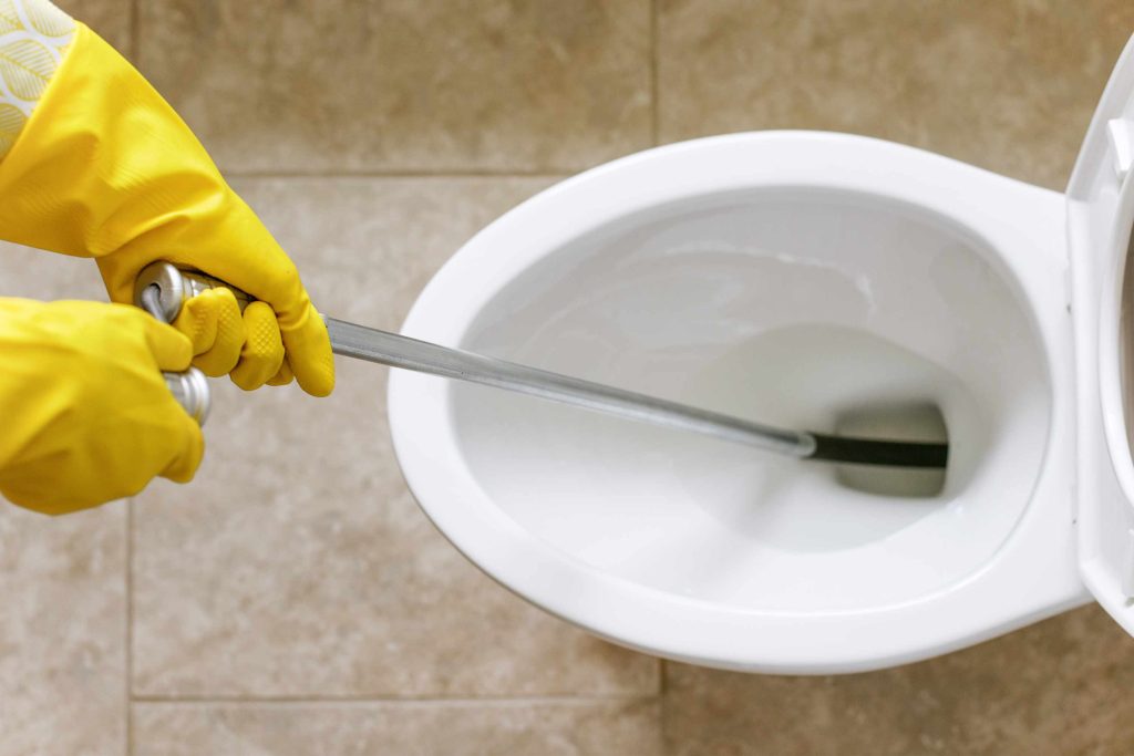 How To Use A Plumbing Auger On A Toilet