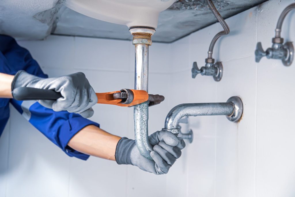 Landlord Replacing Plumbing And Making A Mess In Apartment