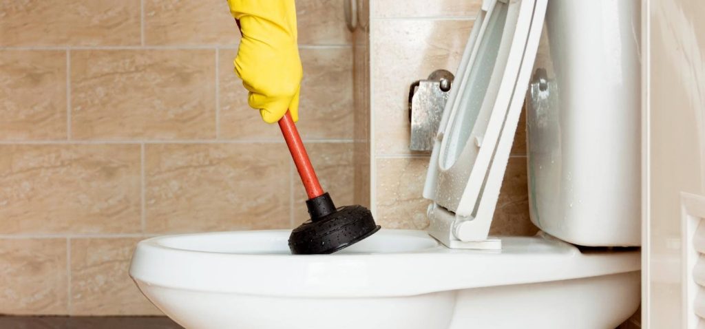 My Toilet Is Filled Do I Call A Plumber
