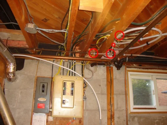 Picture Of A Plumbing Going Through A Breaker Box: Safety Risks & Solutions
