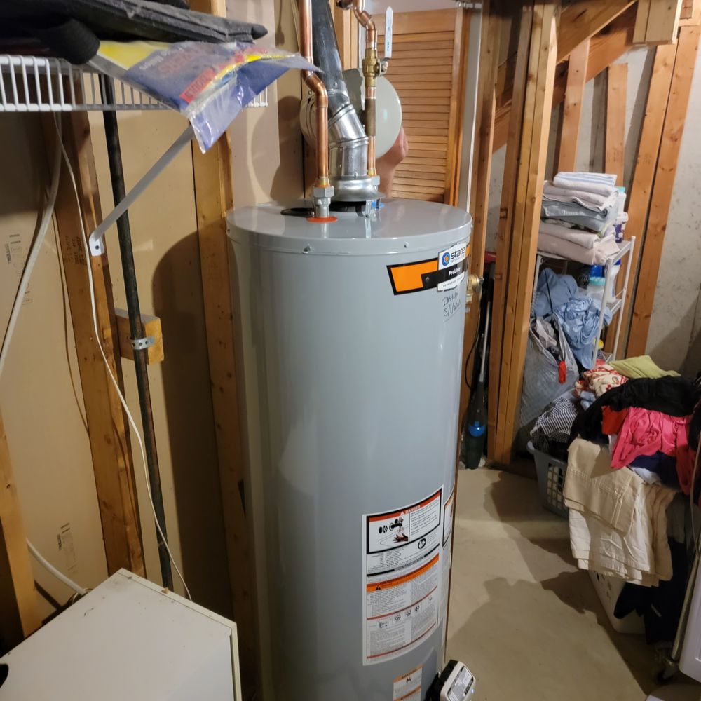 Plumber or Electrician for Hot Water Heater Edwardsville IL?