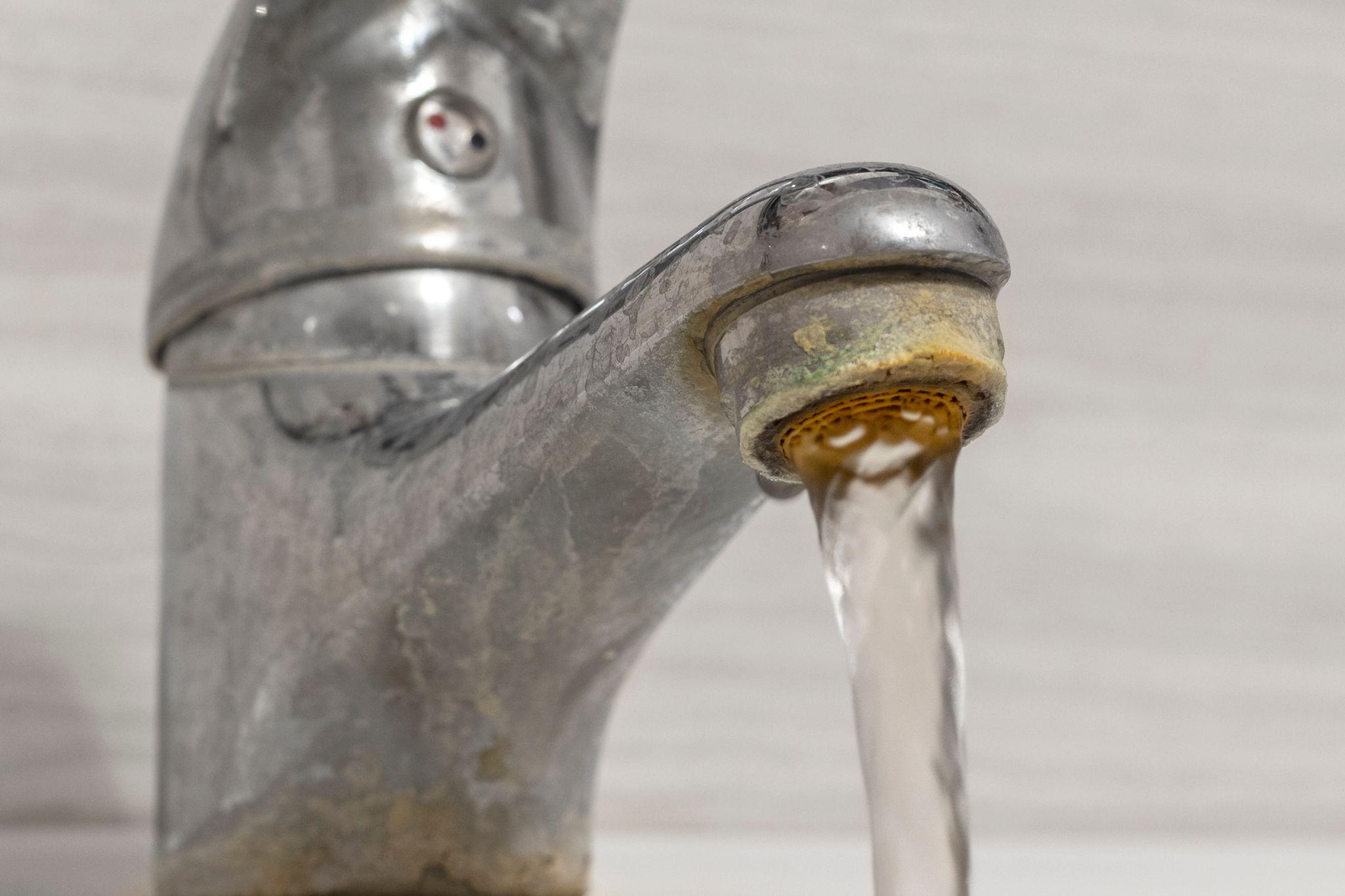 Hard Water Plumbing Problems: Causes & Fixes