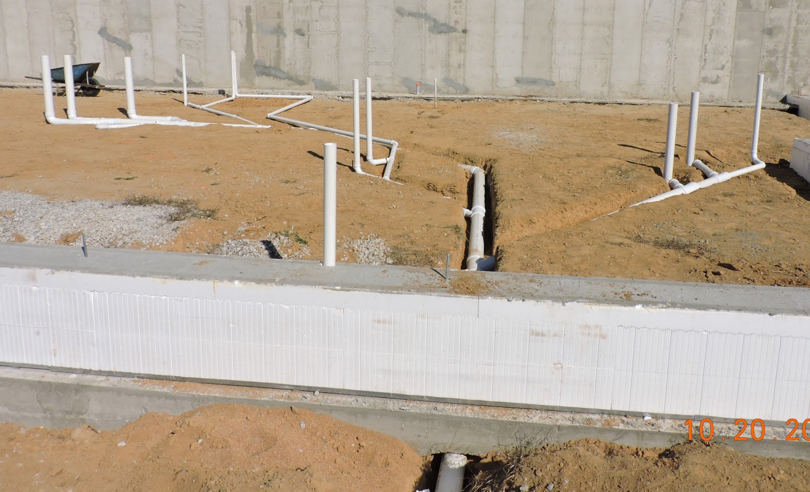 Should Rough Plumbing Run Up Against Concrete Foundation Wall?