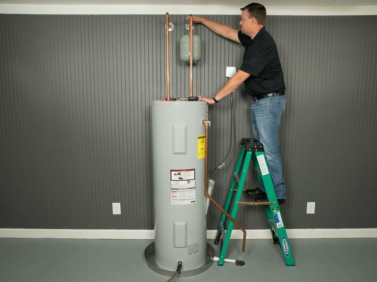 Should You Hire a Plumber to Flush Hot Water Heater?