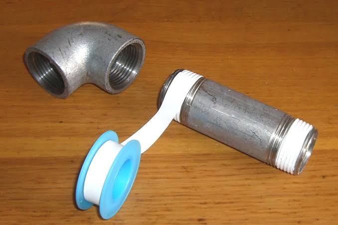 Applying Plumbing Tape When Installing A Shower Head