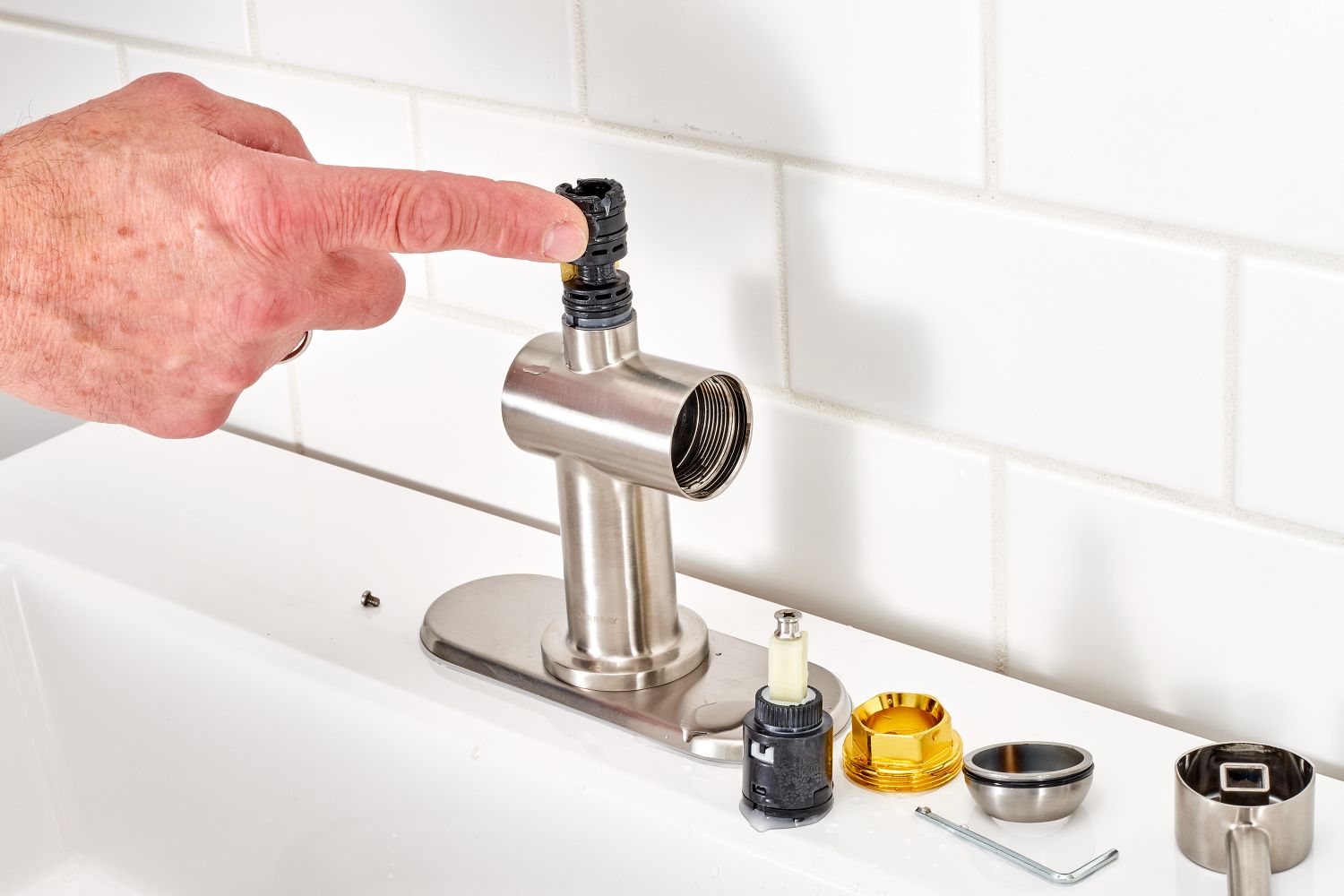 Stop Leaks: Coat The Exposed Handle Stems With Plumber’S Grease